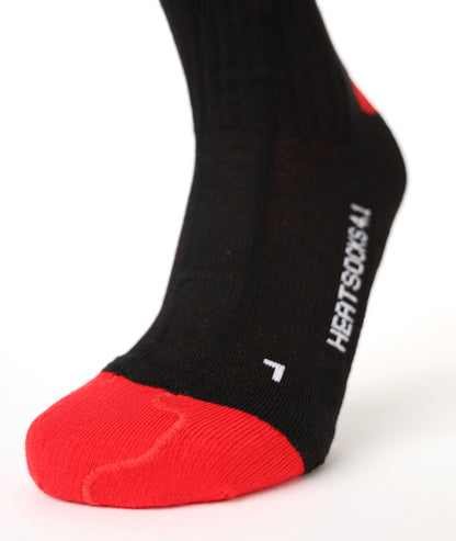 Close-up of the black LENZ Heat Sock 4.1 foot showing the red reinforced toe and HEATSOCKS 4.1 text