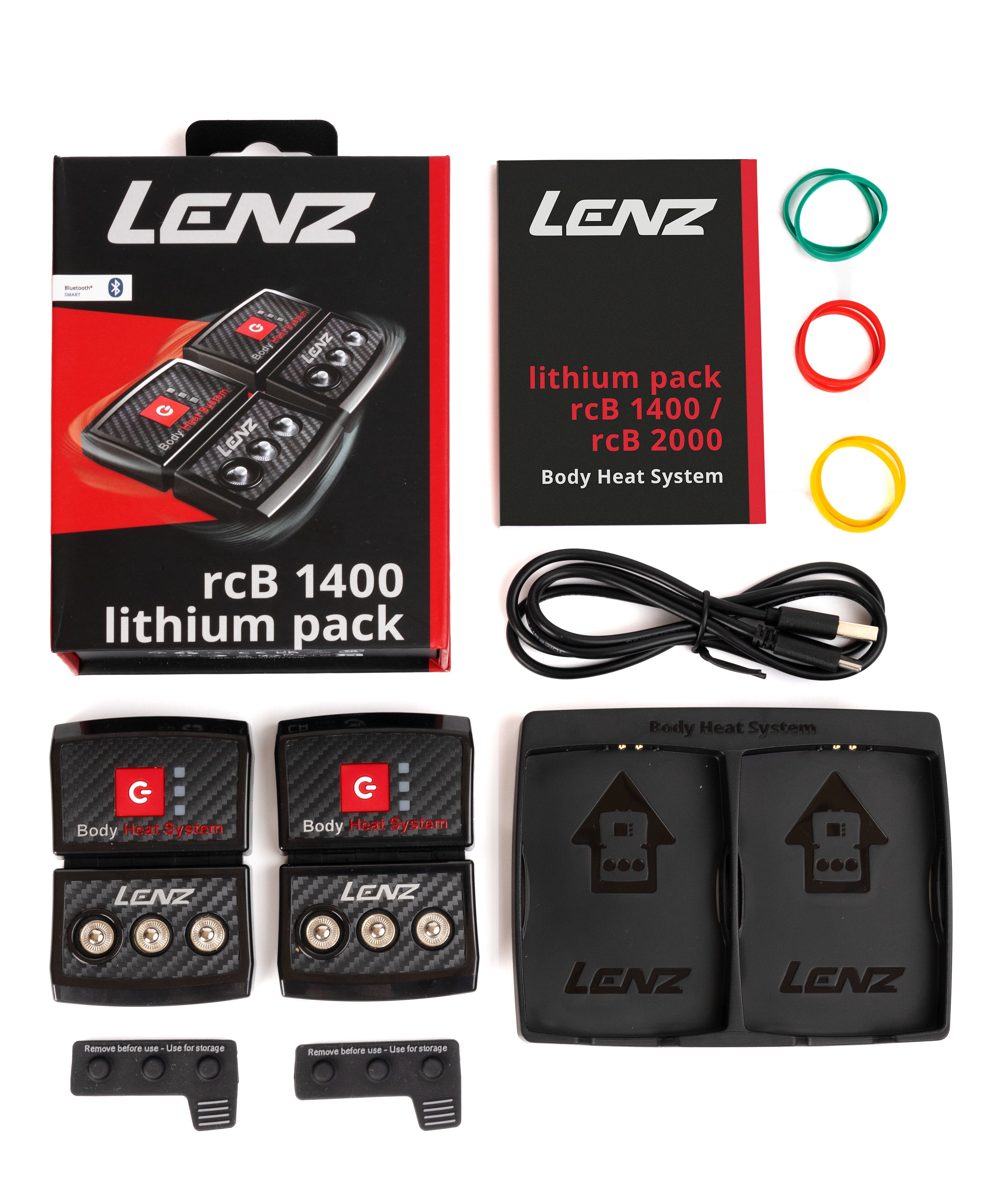 LENZ rcB 1400 lithium pack kit contents, two battery packs, twin cradle, USB cable, manual and coloured marker rings, flat lay

