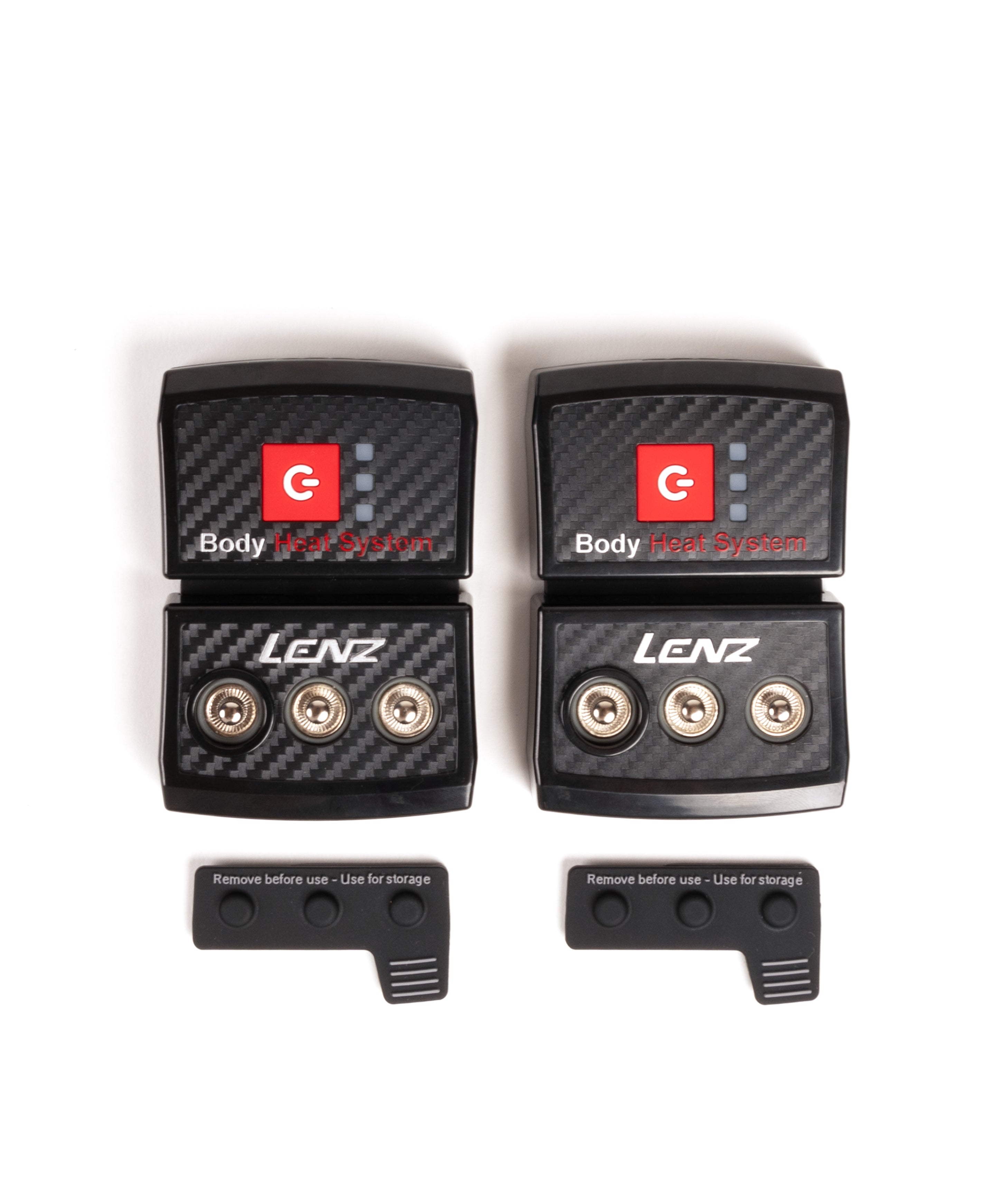 Two black LENZ rcB 1400 battery packs showing press-stud connectors with storage caps set below, top view