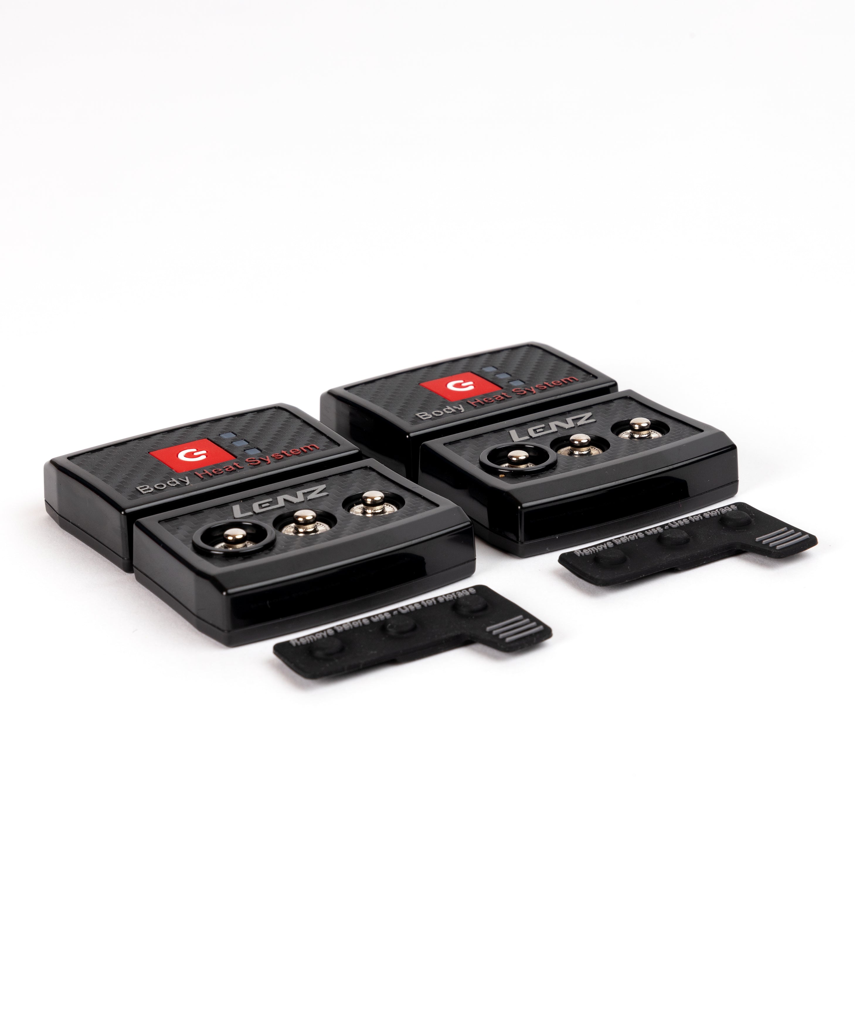Two black LENZ rcB 1400 battery packs showing three press-stud connectors each, with storage caps, angled view